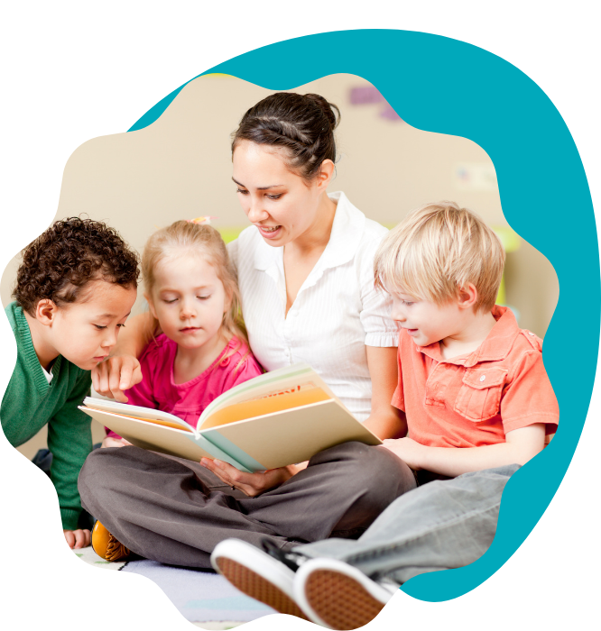 Child care provider reading books to children
